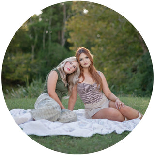two girls modeling sparkly Mardi Gras attire