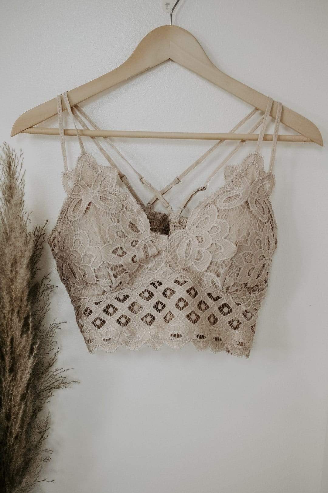 http://selecttrendsboutique.com/cdn/shop/products/taupe-plus-lace-me-up-bralette-intimates-28631127228482.jpg?v=1638212575