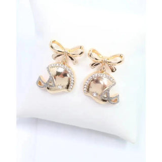 Gold Football Helmet Bow Earrings
