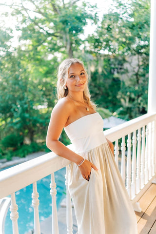 White strapless top and linen bottom maxi dress. The top can be folded over or worn all the way down