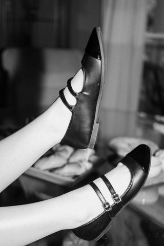 rounded toe and double strap design Mary Jane flats with adjustable buckles and contrast toe cap, top view
