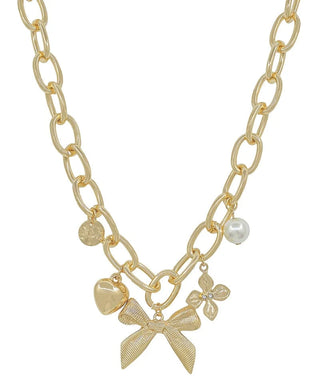 Gold chin link necklace with bow, heart, circle, flower, and pearl charms.