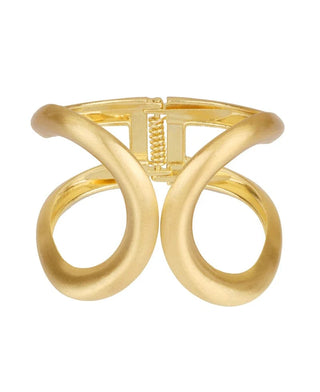 Gold curved and hinged cuffed bracelet.
