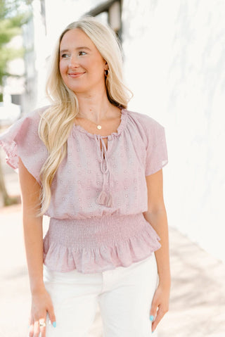 Lavender eyelet lace tie front blouse with smocked waist.