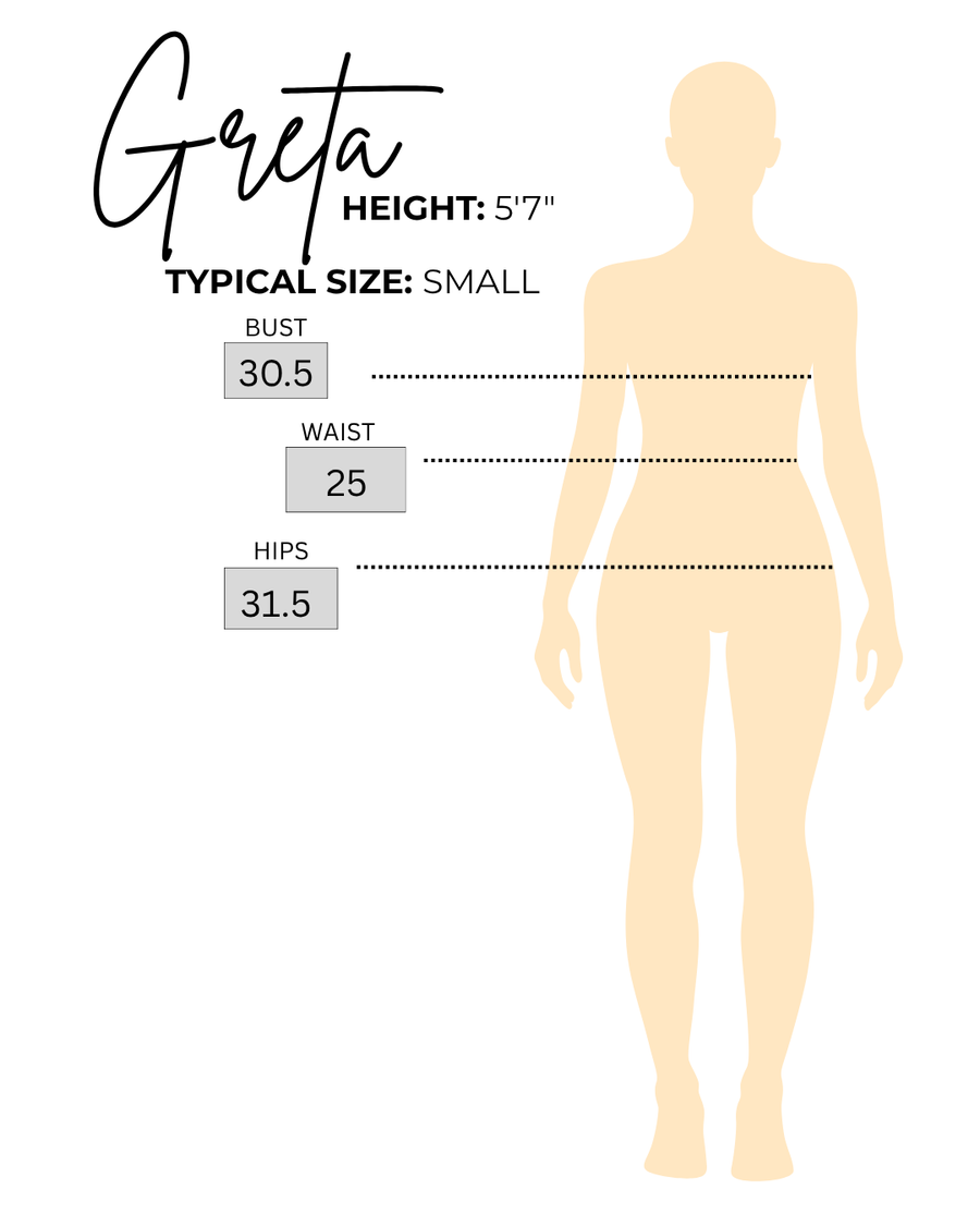 Sizing chart for Greta, the model wearing Navy Tailored High Waisted Skort