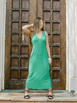 kelly emerald green deep v neck sleeveless flowy midi dress with black lace up sandals