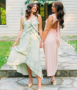 Women modeling feminine boutique dresses for spring events and special occasions
