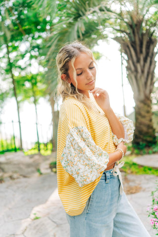 Yellow and white stripes with yellow and white floral sleeves 