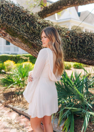low back mini dress Latina Open with 1cm grading between sizes Also available in mid grey Beige Bell Sleeve Low Back