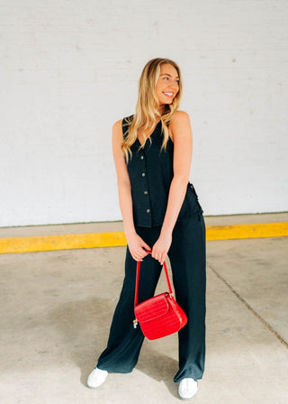 Business casual v-neck black button down vest with matching pants 
