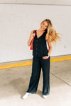 Black button down flowy vest with matching black pants 