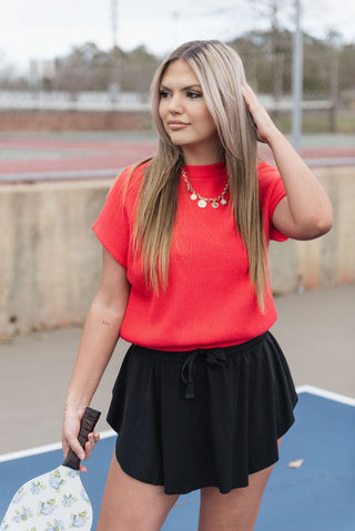 Tomato Banded Bottom Knit Top