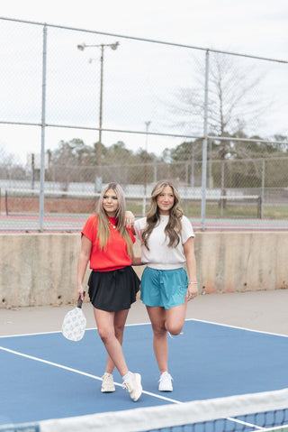 Tomato Banded Bottom Knit Top