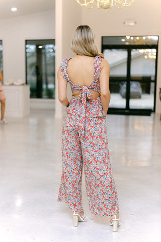 Coral Floral Ruffle Jumpsuit from Select Trends Boutique