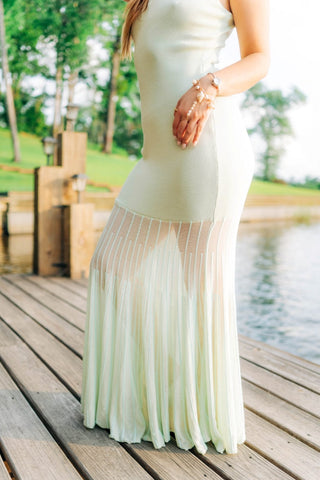 Mint green dress fitted towards the top with sheer flowy bottom 