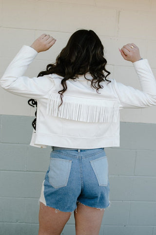 White Fringe Vegan Leather Jacket from Select Trends Boutique