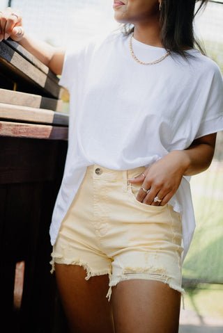 Yellow High Rise Distressed Denim Shorts